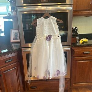 Little girl spring flower dress. Purple flower petal skirt detail